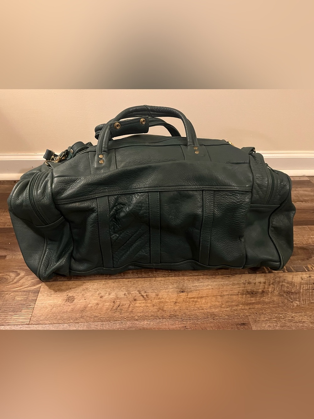 Vintage green leather duffel